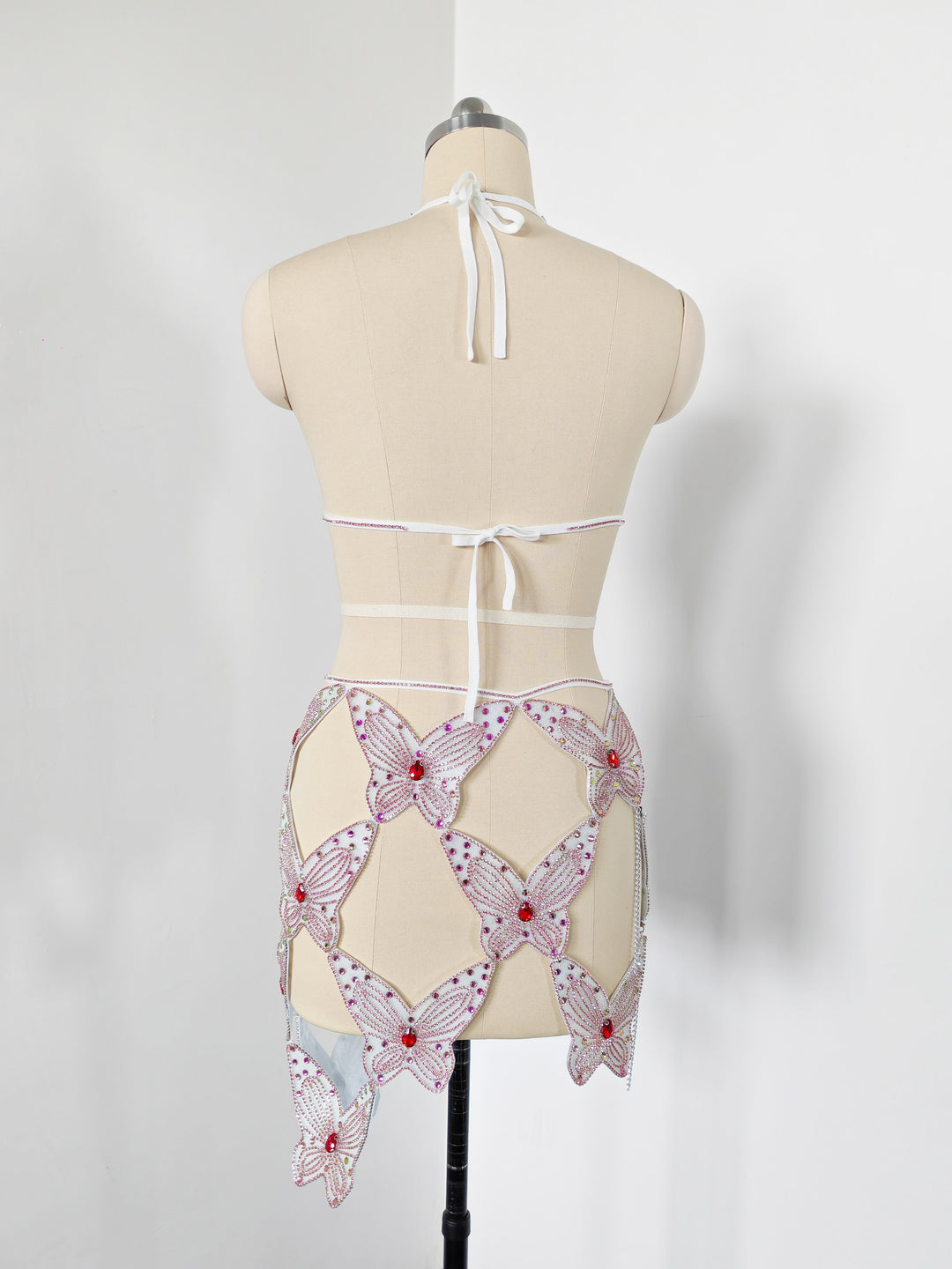 Hot Fashionista - Women's Online Fashion Dress | Astra Triangle Butterfly Detailed Rhinestone Top with Mini Skirt